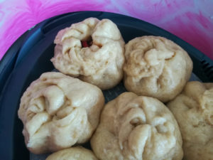 Chinese Steamed Buns - Dim Sum - Gefüllte gedämpfte Brötchen