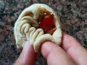 Chinese Steamed Buns - Dim Sum - Gefüllte gedämpfte Brötchen