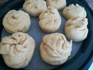 Chinese Steamed Buns - Dim Sum - Gefüllte gedämpfte Brötchen